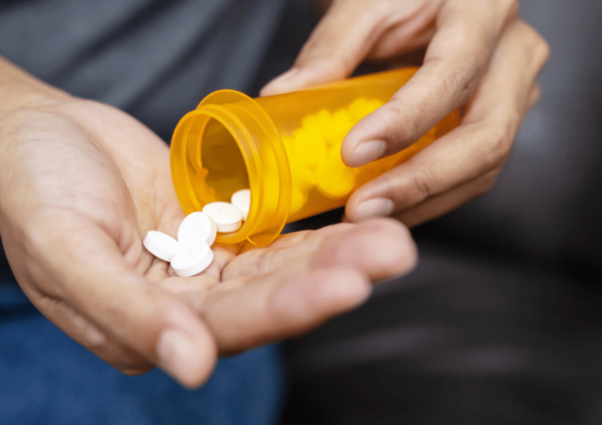 Pills poured into hand